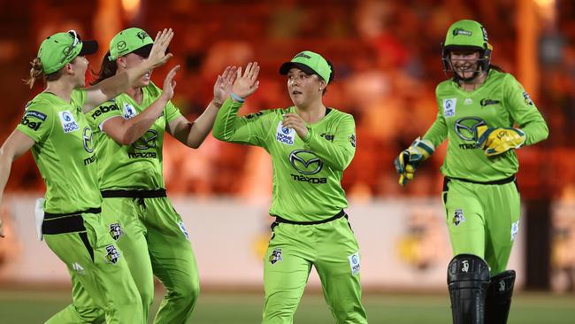 Lauren Smith celebrates a wicket with her Sydney Thuner teammates during the Women's Big Bash League final. Picture: Ryan Pierse/Getty Images