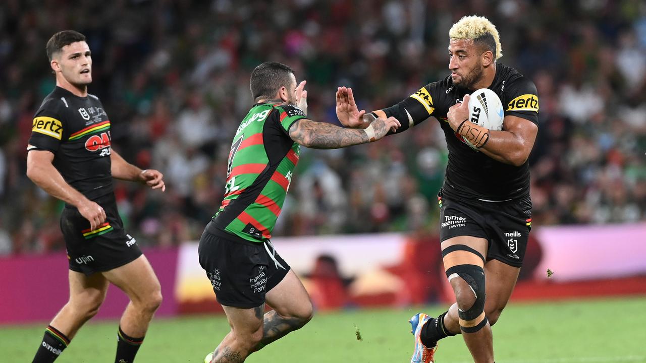 BRISBANE, AUSTRALIA - OCTOBER 03: Viliame Kikau of the Panthers fends off Adam Reynolds of the Rabbitohs during the 2021 NRL Grand Final match between the Penrith Panthers and the South Sydney Rabbitohs at Suncorp Stadium on October 03, 2021, in Brisbane, Australia. (Photo by Bradley Kanaris/Getty Images)