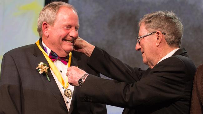 Jack being inducted into the Sport Australia Hall of Fame by Peter Thompson.