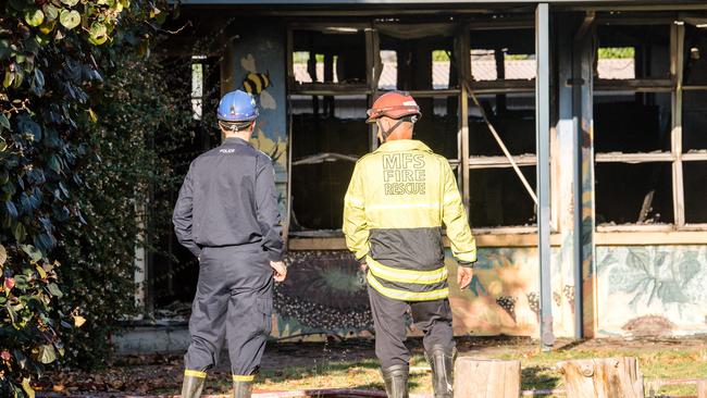 The MFS inspects arson damage to the Hampstead Primary School.