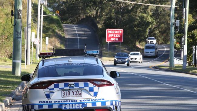 Police pull over a motorist on the Qld NSW border in Miles St Coolangatta as the hard border closure looms. Picture Glenn Hampson