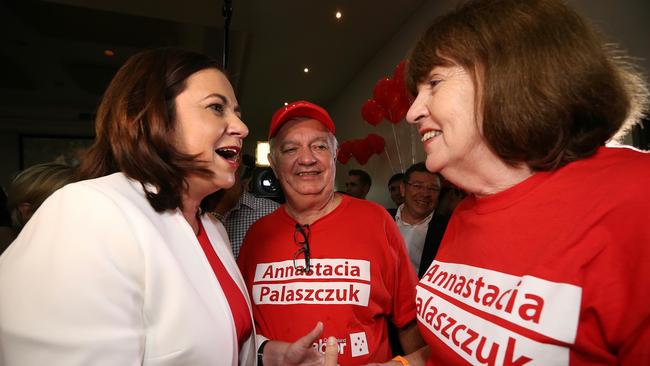 Annastacia Palaszczuk at her election party at the Queensland Lions Soccer Club in Richlands with dad Henry and mum Lorelle in 2015. Picture: Adam Head