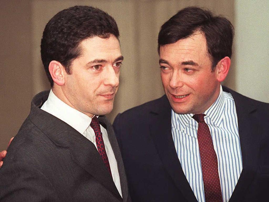 Ian Maxwell, on right, with brother Kevin Maxwell in 1996 after they were cleared of fraud charges. Picture: AFP