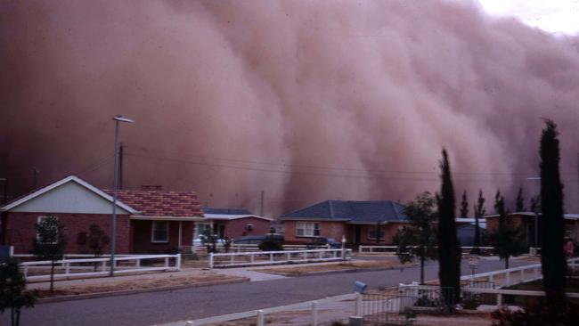 A dust storm engulfs houses in Elizabeth Downs, Adelaide, in February 1968. Picture: State Library of South Australia