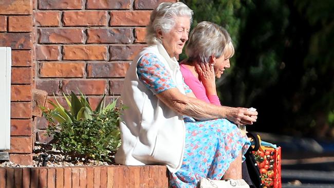 Residents are seen outside the Earle Haven Nursing Home residents have been left devastated by the situation (AAP Image/Tim Marsden)