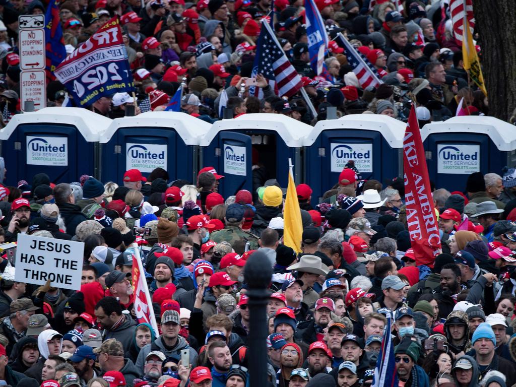 People wait on the National Mall outside a security perimeter for a rally of supporters of US President Donald Trump. Picture: AFP