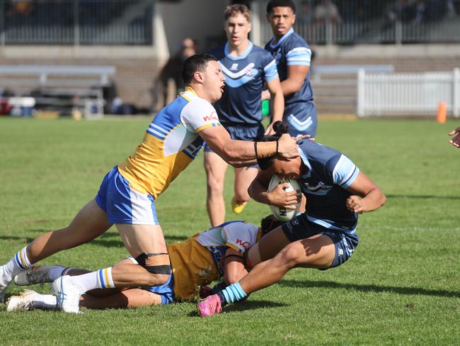 The Peter Mulholland Cup at Ringrose Park, Wentworthville today. Patrician Brothers Blacktown (blue and yellow) v Matraville SHS. Picture: Tim Hunter.
