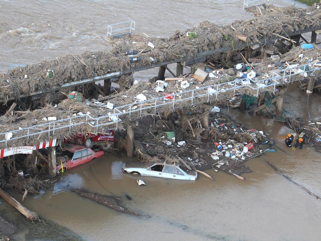 Debris including cars washed on to the bridge in the 2011 floods