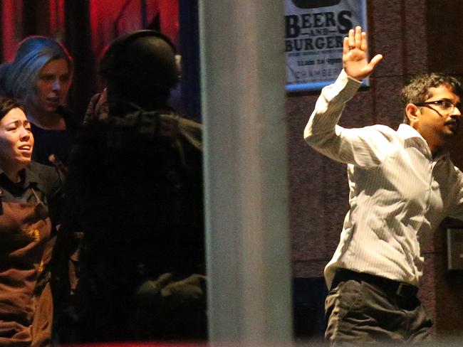 A group of hostages kicked down the door, startling the gunman as they tried to escape. (AP Photo/Rob Griffith)