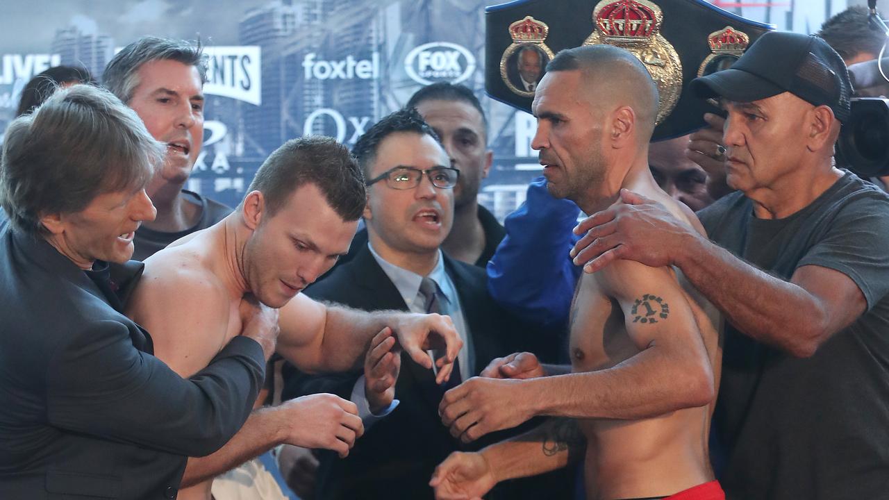 Mundine and Horn clash during the weigh-in.