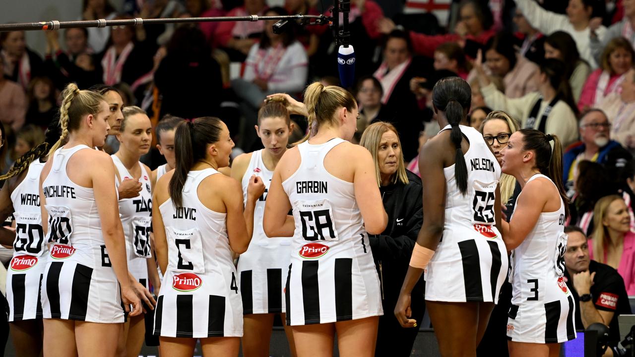 Nicole Richardson, head coach of the Magpies talks to players during a time-out. Picture: Sue McKay