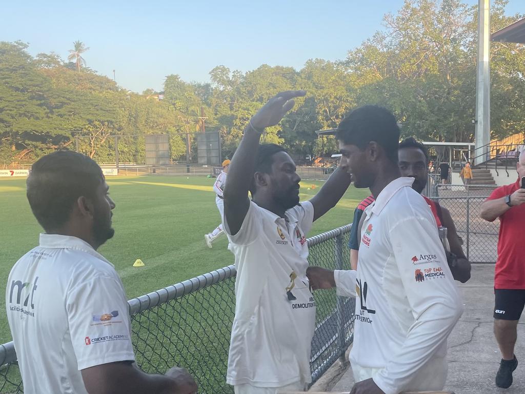 Udara Weerasinghe congratulates Ash Chandrasinghe on his hundred against Tracy Village. Picture: Ben Cameron