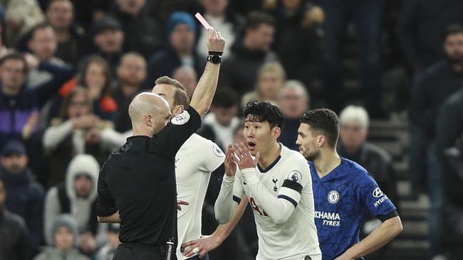 Referee Anthony Taylor shows a red card to Tottenham's Son Heung-min. Picture: AP