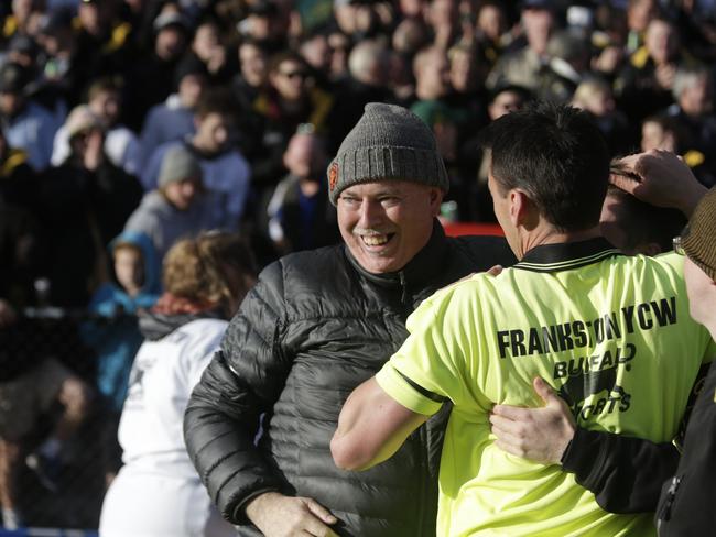 Frankston YCW coach Scott Mathers celebrates after the final siren. Picture: Valeriu Campan