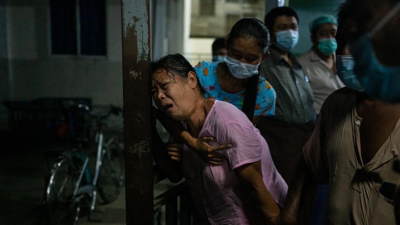 A mother mourns at a hospital after her son was killed yesterday. Picture: StringerGetty Images