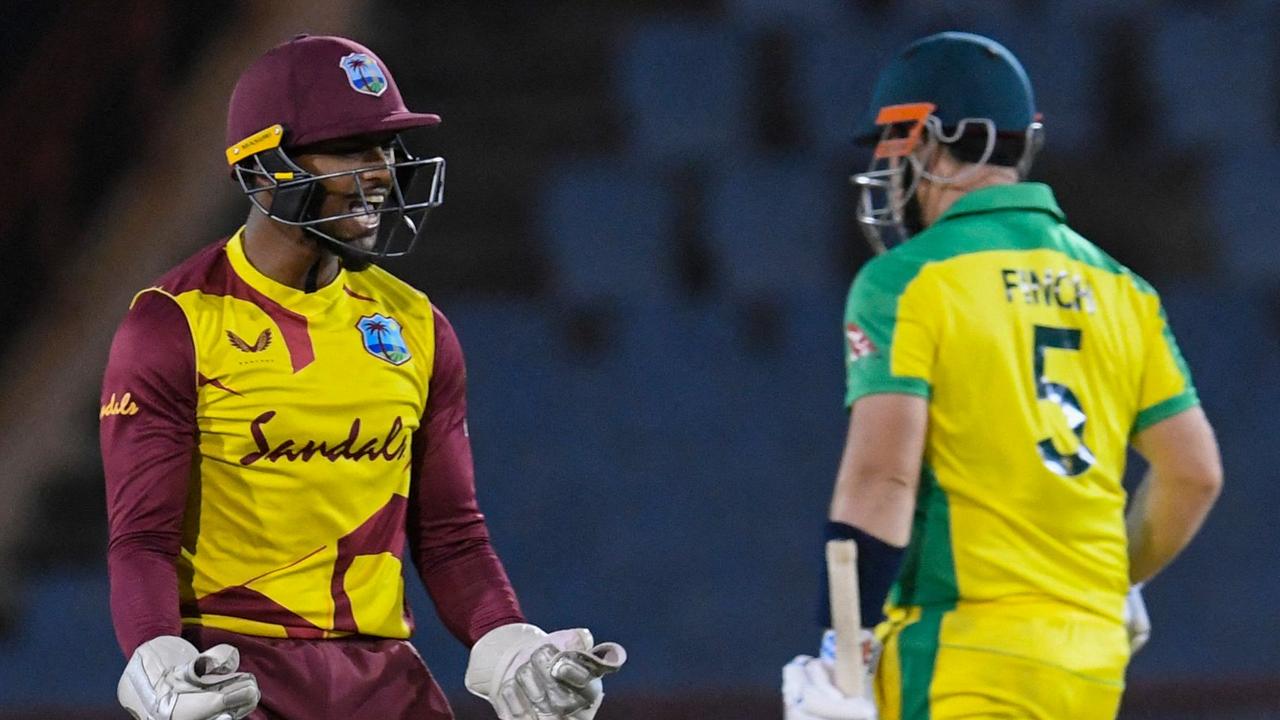 West Indies vs Australia 1st T20 score: Batting collapse ...