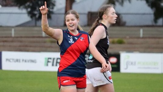 Tegan Brett celebrates a goal for Coburg. Picture: Dan Atamian