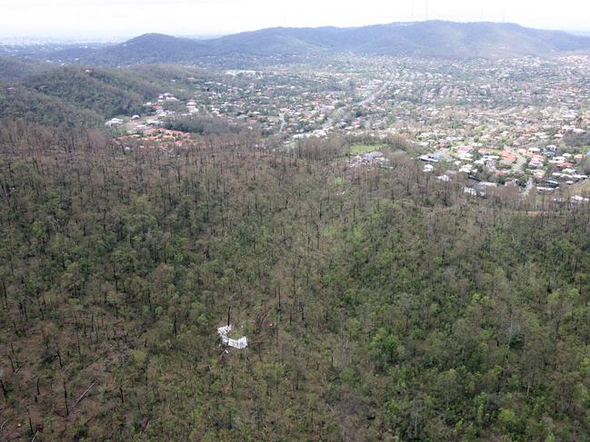 BSM. News. 19.11.2008. Aerial pictures of general storm damage around The Gap. Story?. Roof lying blown across the range to the Keperra side. Photo Campbell Scott.