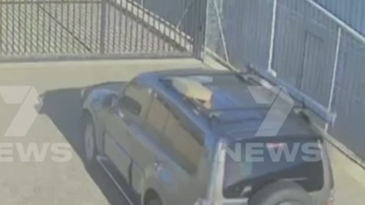 CCTV footage from the storage facility shows the box with the weeding dress in on the roof of the car as they drive away. Picture: Channel 7.