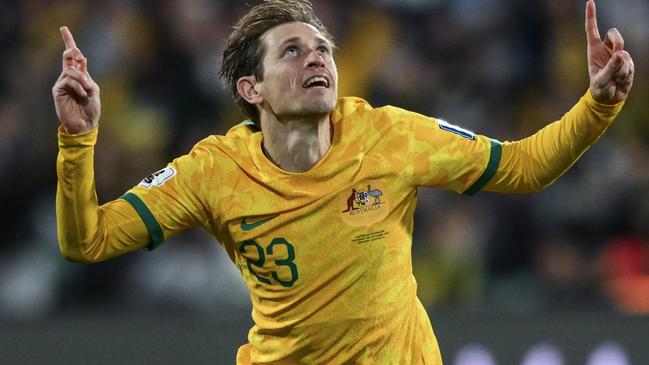 ADELAIDE, AUSTRALIA - OCTOBER 10: Craig Goodwin of the Socceroos   celebrates after scoring his teams second goal  during the third round FIFA World Cup 2026 Qualifier match between Australia Socceroos and China PR at Adelaide Oval on October 10, 2024 in Adelaide, Australia. (Photo by Mark Brake/Getty Images)