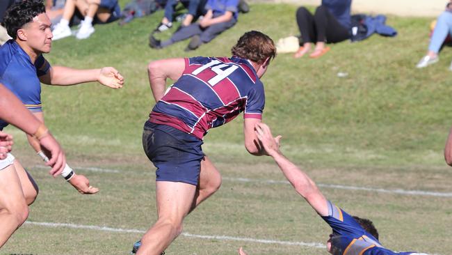 GPS schoolboy rugby union game between The Southport School and Churchie. TSS Player No14 TRY Blake Raymond Churchie Player No Picture Mike Batterham