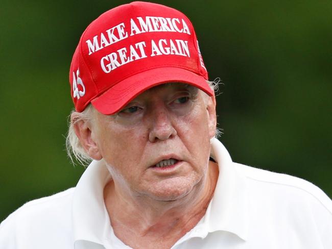 *** BESTPIX *** BEDMINSTER, NEW JERSEY - JULY 28: Former U.S. President Donald Trump reacts after his shot from the second tee during the pro-am prior to the LIV Golf Invitational - Bedminster at Trump National Golf Club Bedminster on July 28, 2022 in Bedminster, New Jersey. (Photo by Cliff Hawkins/Getty Images)