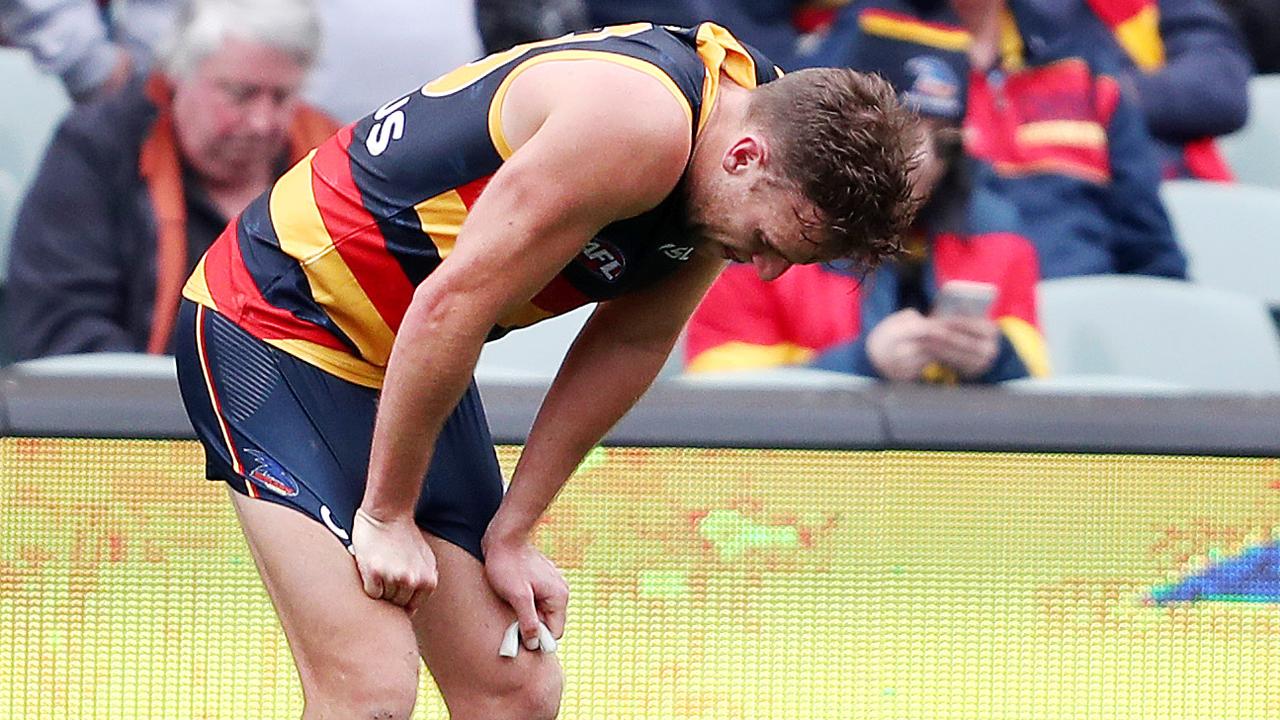 A shattered Brodie Smith, who had a chance at winning the game with a kick at goal on the run, after Adelaide’s loss to Essendon. Picture: Sarah Reed