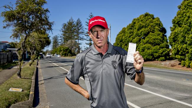 Warren baker with the offending ticket. Picture: Jerad Williams