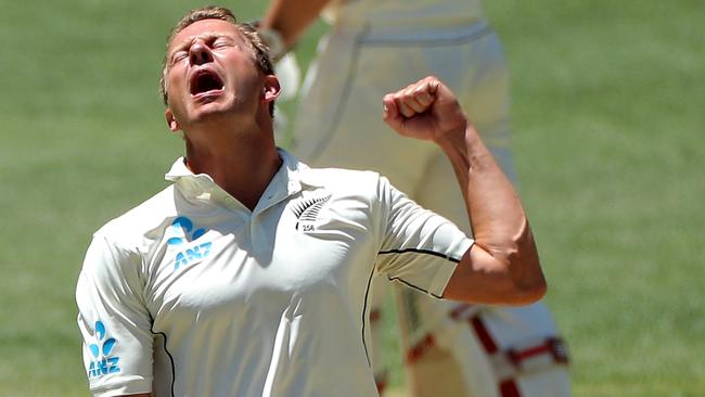 New Zealand’s Neil Wagner celebrates taking the wicket of Pat Cummins in Perth. Picture: AAP