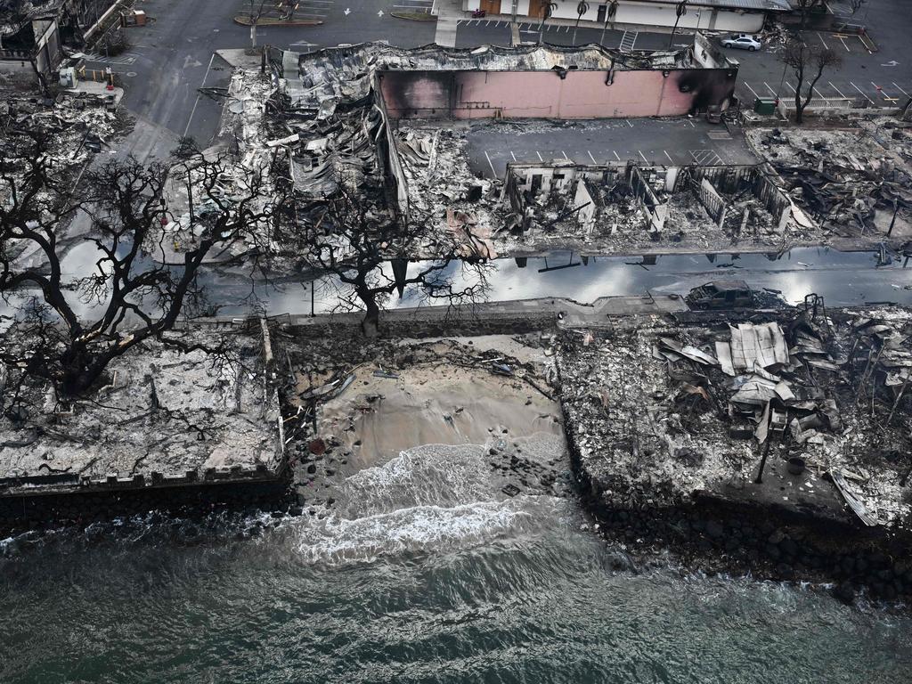 Residents were forced to jump in the ocean as the flames got closer to them. Picture: AFP