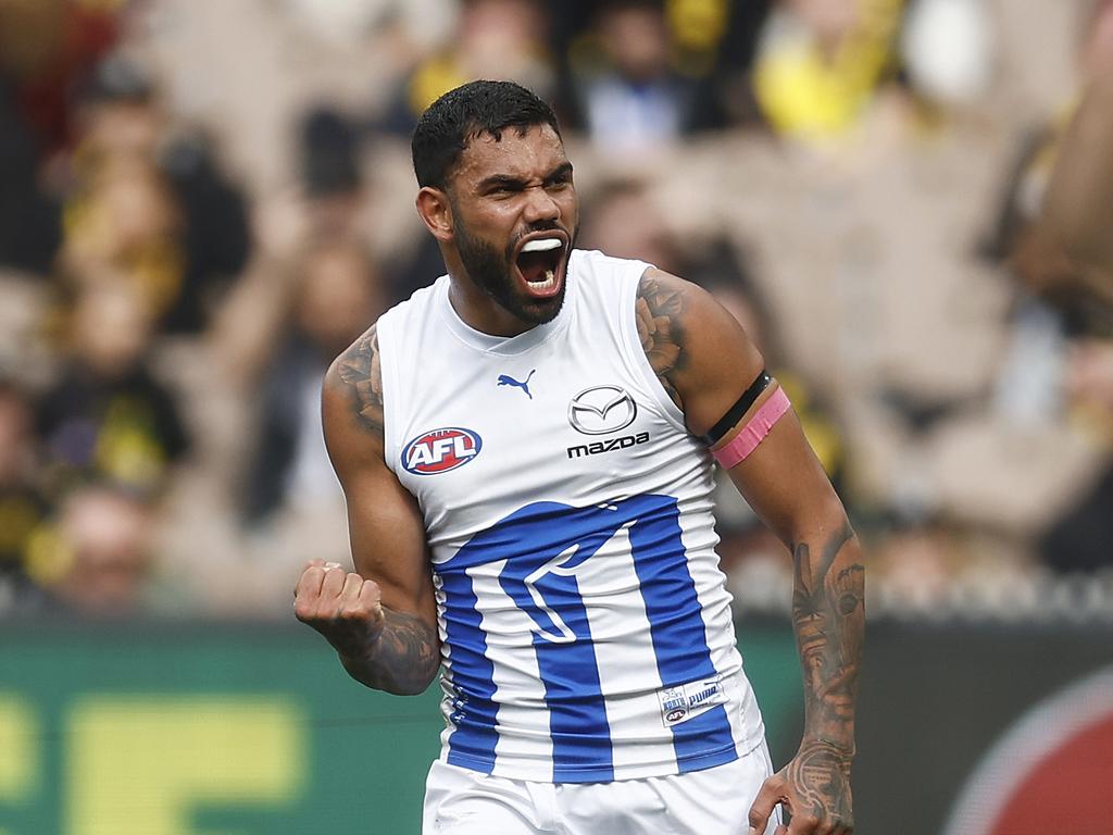 MELBOURNE, AUSTRALIA – AUGUST 19: Tarryn Thomas of the Kangaroos celebrates kicking a goal during the round 23 AFL match between Richmond Tigers and North Melbourne Kangaroos at Melbourne Cricket Ground, on August 19, 2023, in Melbourne, Australia. (Photo by Daniel Pockett/Getty Images)