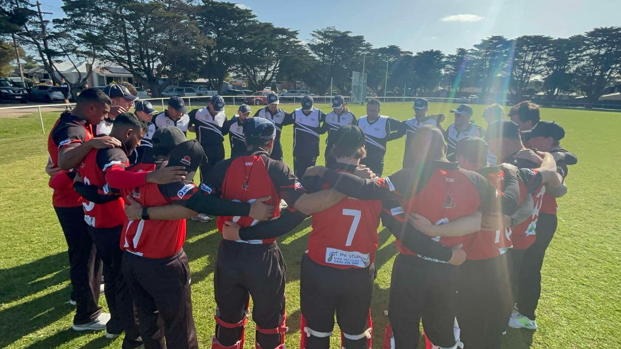 Little River and Manifold Heights cricketers link arms following the death of Sharks player Jayme Sykes. Picture: Little River Redbacks.