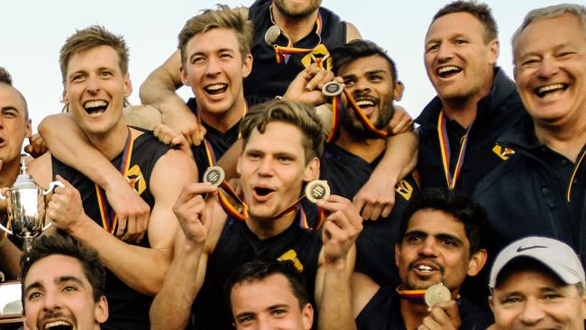 Scotch Old Collegians celebrate their division three flag in 2018 with Jy Farrar in the team. Picture: AAP Image/Morgan Sette