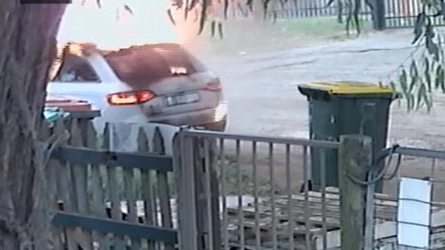 CCTV video of the moment the suspected getaway car was torched. Picture: 9 News