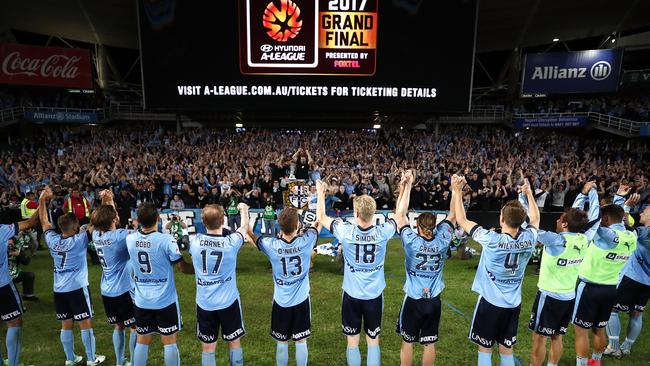 Sydney FC celebrate victory.