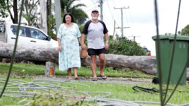 Tracy and Terry Whelan, the neighbours gum cut power on Friday night, Muriel St, is without power, Redland Bay – on Tuesday 11th March 2025 – Photo Steve Pohlner