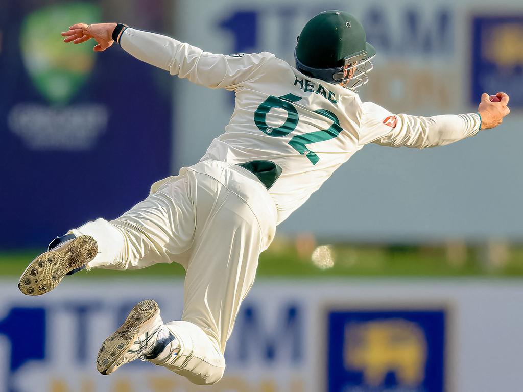 Travis Head takes a screamer to dismiss Sri Lanka's Angelo Mathews. Picture: AFP