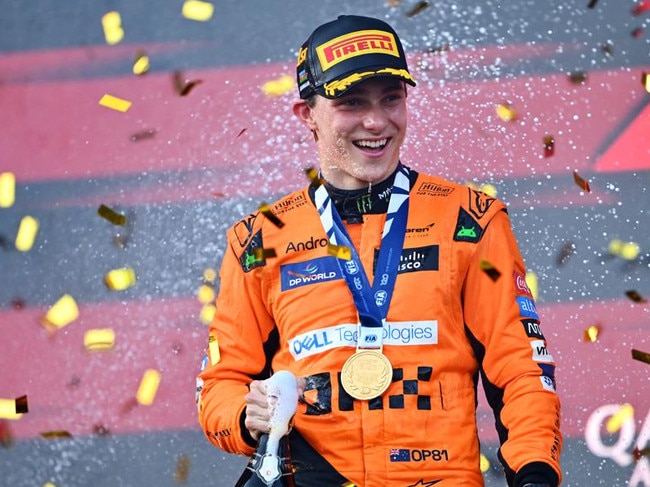 Piastri celebrates on the podium during the F1 Grand Prix of Azerbaijan at Baku City Circuit. Picture: Dan Mullan