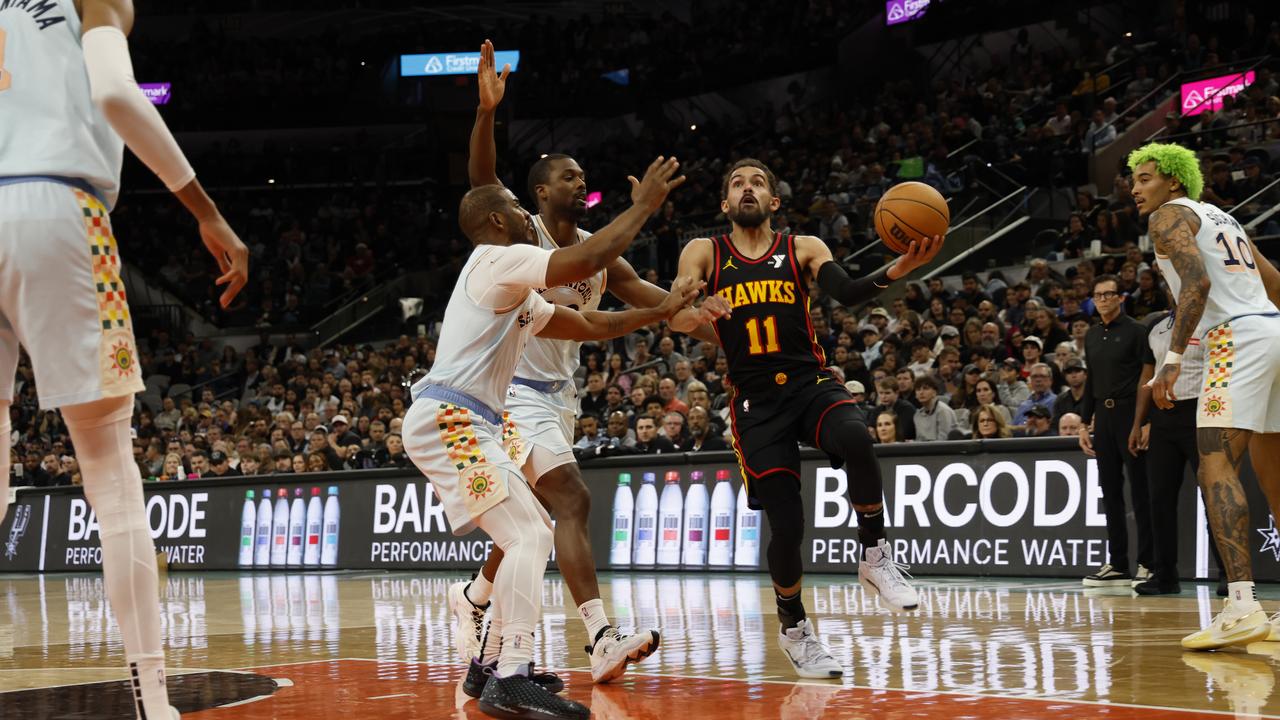 Trae put the Hawks on his back. (Photo by Ronald Cortes/Getty Images)