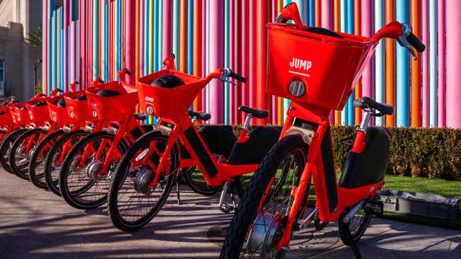 Uber has announced plans to bring its bright orange Jump e-bicycles to “multiple” cities in Australia. The vehicles have a top speed of more than 30km/h. Picture: Jennifer Dudley-Nicholson