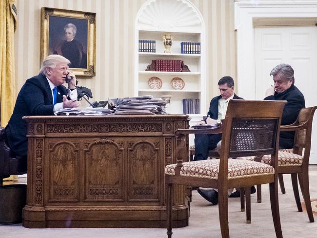 Steve Bannon by Mr Trump’s side during that controversial phone call with Malcolm Turnbull last February. Picture: Pete Marovich /Consolidated News Photos/AFP