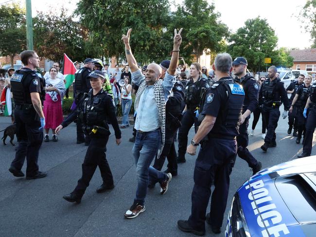 Waddah Weld Ali is detained by police at the University of Queensland St. Lucia campus during a protest on May 20, 2024. Picture: Liam Kidston