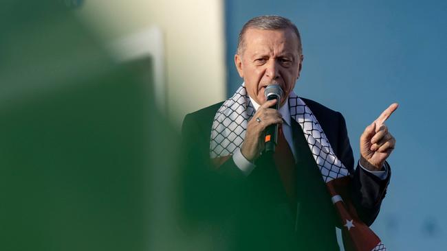 Tayyip Erdogan addresses the rally in Istanbul on Saturday. Picture: AFP