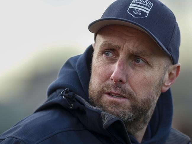 Caulfield Grammarians coach Simon Williams at the huddle. Picture: Valeriu Campan