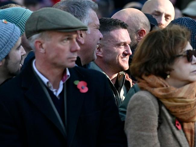 Founder and former leader of the anti-Islam English Defence League, Tommy Robinson, centre, in the crowd near the Cenotaph on Whitehall. Picture: AFP