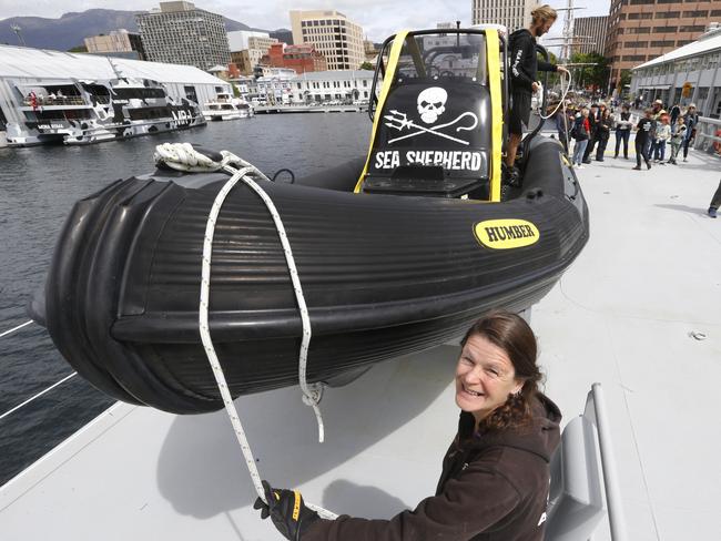 Ocean Warrior crew member Penny Keeling ties down the vessels state-of-the-art Zodiac.