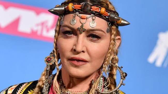 (FILES) In this file photo taken on August 21, 2018 Madonna poses in the press room at the 2018 MTV Video Music Awards at Radio City Music Hall on August 20, 2018 in New York City. (Photo by ANGELA WEISS / AFP)