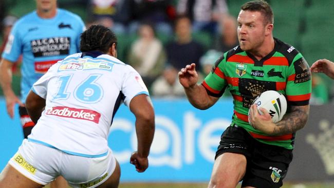 Nathan Brown evades Agnatius Paasi during round 13.