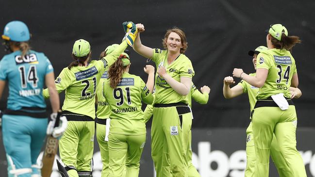 Sammy-Jo Johnson celebrates a wicket in Sydney Thunder’s rain-affected win.