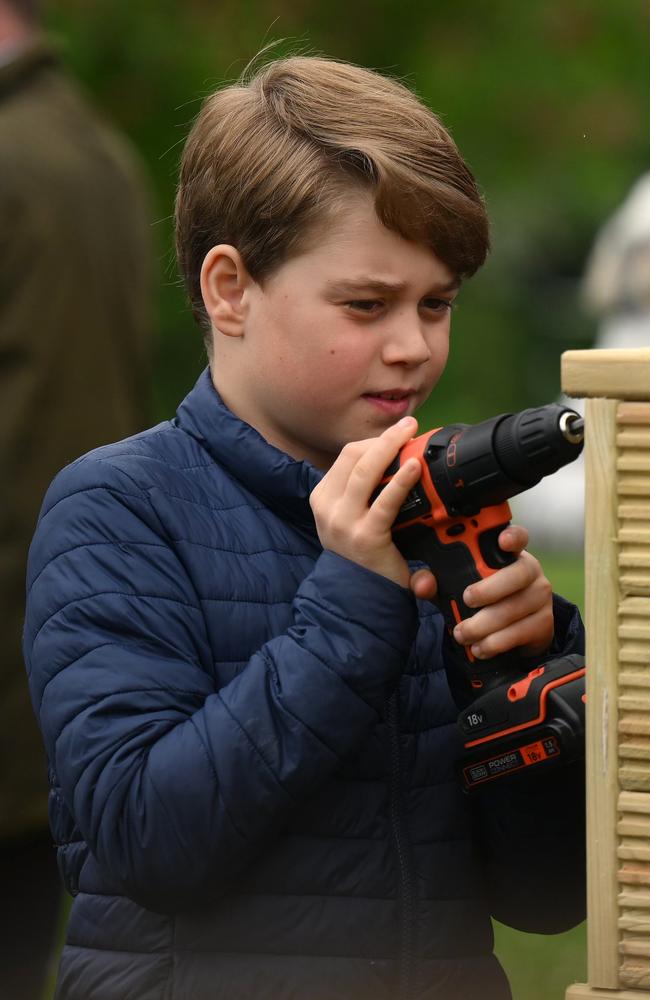 Prince George takes part in the Big Help Out during a visit to the 3rd Upton Scouts Hut in Slough as part of the coronation celebrations. Picture: Getty Images